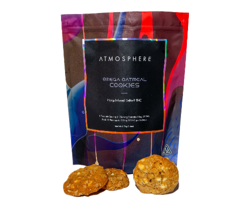 Omega Oatmeal THC cookies by ATMOSPHERE, hemp-derived Delta 9 oatmeal cookies displayed in front of colorful packaging.