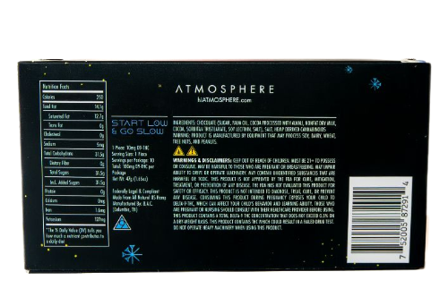 Back of Sirius Milk THC chocolate bar by ATMOSPHERE showing nutrition facts, dosage guide, and ingredient list for Delta 9 milk chocolate.